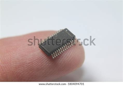 Microchip On Finger Integrated Circuit Stock Photo