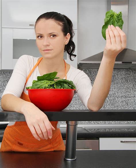 Woman With A Spinach In A Modern Kitchen Stock Image Image Of Diet