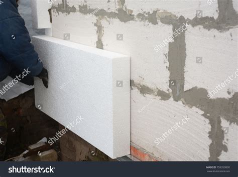 Builder Installing Rigid Styrofoam Insulation Board Stock Photo ...