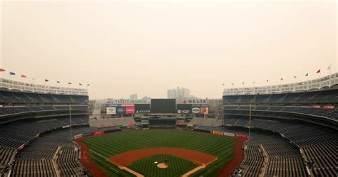 Yankee Stadium Shrouded In Orange Haze Amid Smoke From Canadian Wildfires News Scores