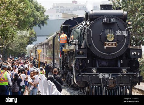 Final Spike Steam Tour Visitors Are Seen Next To The Empress Steam