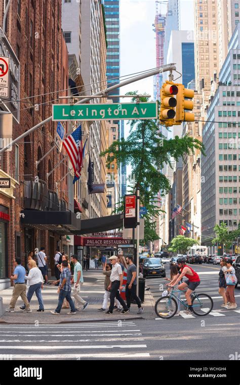 Manhattan Street View In Summer Of People Walking Along Lexington