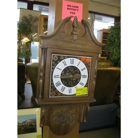 ELECTRIC WALL MOUNT CLOCK - Dodds Auction