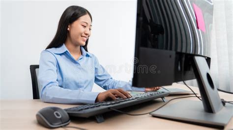 Asian Woman Programming Working With Computer And Typing Data Code To