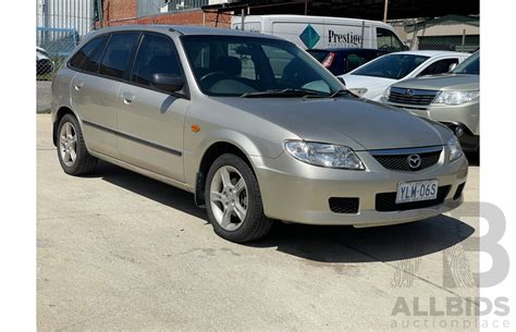 102003 Mazda 323 Astina Shades Lot 1440805 Carbids