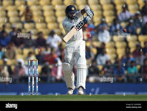 Indian Batsman Murali Vijay Plays A Shot While Playing Against South