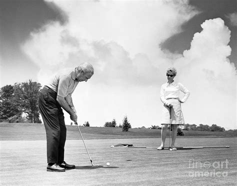 Older Couple Out Golfing C 1960s Photograph By H Armstrong Roberts Classicstock Fine Art America