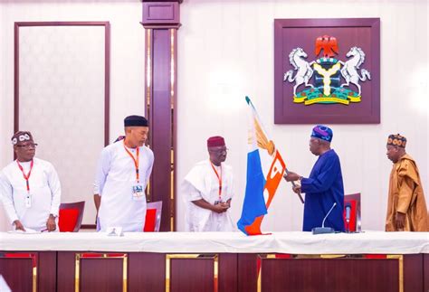 PHOTOS: Tinubu presents APC flag to Monday Okpebholo, Edo guber ...