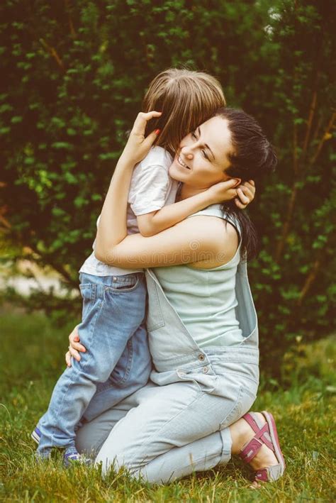 Loving Mother Hugging Her Son Stock Image Image Of Kiss Latino 56756677