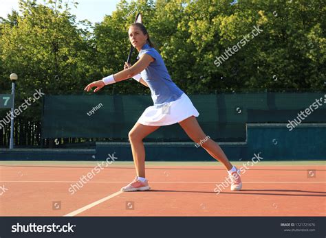 Professional Equipped Female Tennis Player Beating Stock Photo