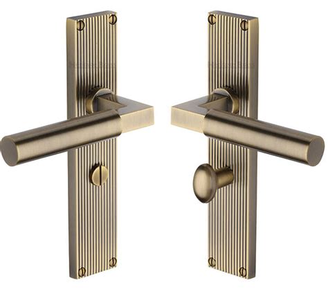 Heritage Brass Bauhaus Reeded Door Handles On Backplate Antique Brass Rr7300 At Sold In