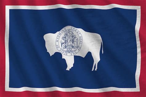 Premium Photo Wyoming Us State Flag With Big Folds Waving Close Up