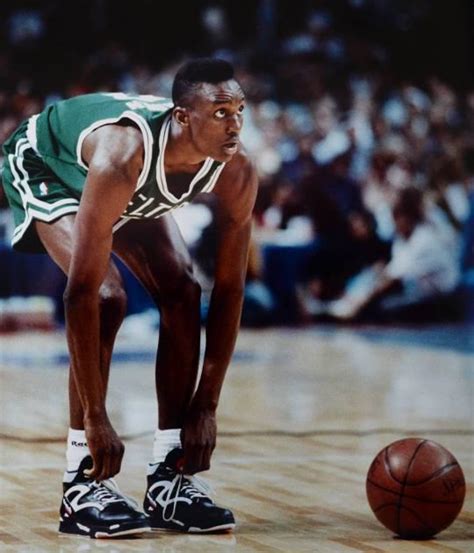 Dee Brown Pumping Up His Reebok Pumps During The 1991 Nba Slam Dunk