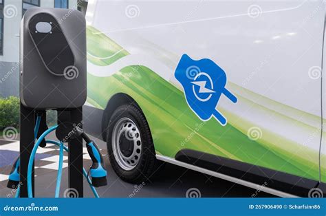 Electric Delivery Van with Charging Station. Stock Photo - Image of ...