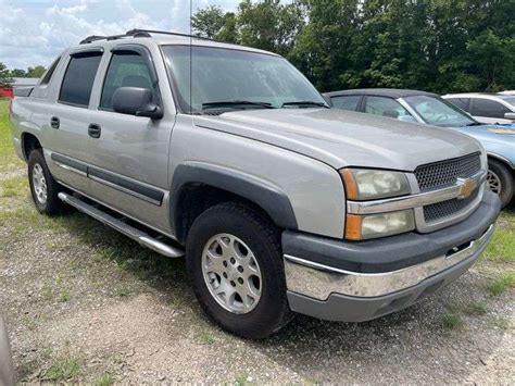 '04 Chevy Avalanche Silver - Bonnette Auctions