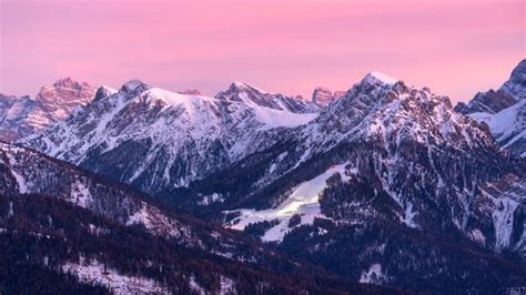 Premium Photo | A pink sunset over the mountains