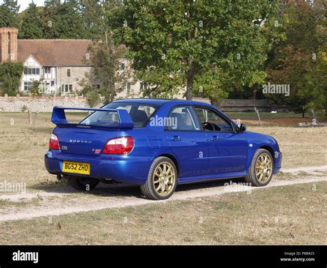 Subaru Impreza Wrx Sti In Wr Blue Pearl Colour With Alloy Wheels