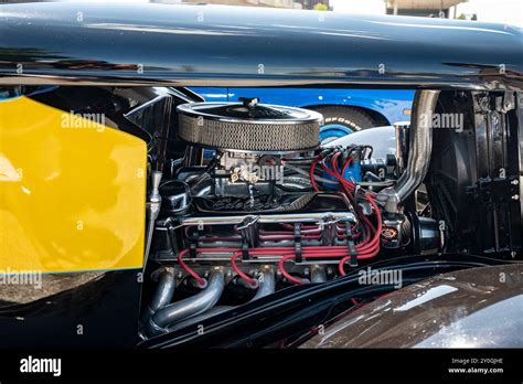 A Classic Hot Rod Car With Its Custom Modifications And Powerful