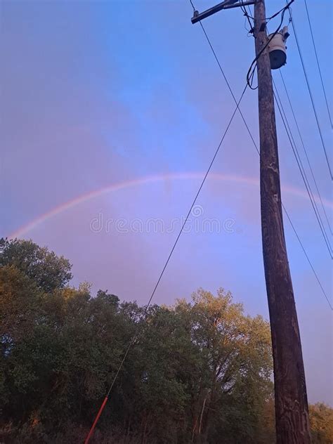 Double Rainbow with Storm Clouds Still Hanging Around. Stock Image ...