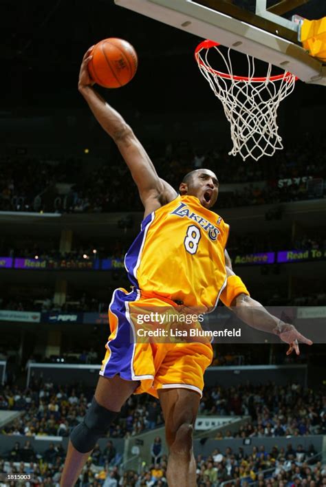 Kobe Bryant of the Los Angeles Lakers slam dunks during the NBA game ...