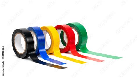 Rolls of insulation adhesive tape, multi colored ribbons on a white ...