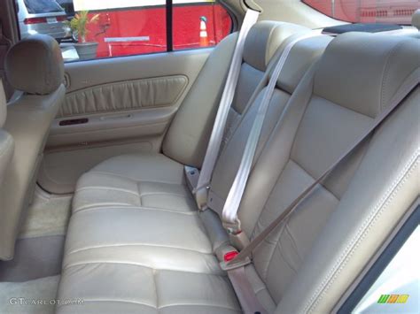 Beige Interior 1999 Nissan Maxima GLE Photo #88231449 | GTCarLot.com