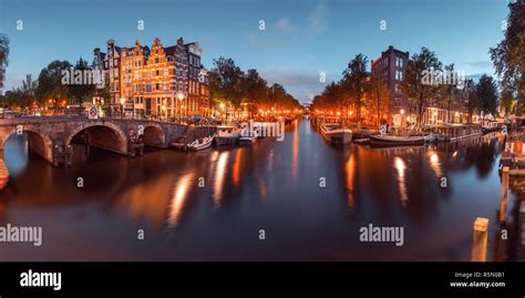 Night City View Of Amsterdam Canal And Bridge Stock Photo Alamy