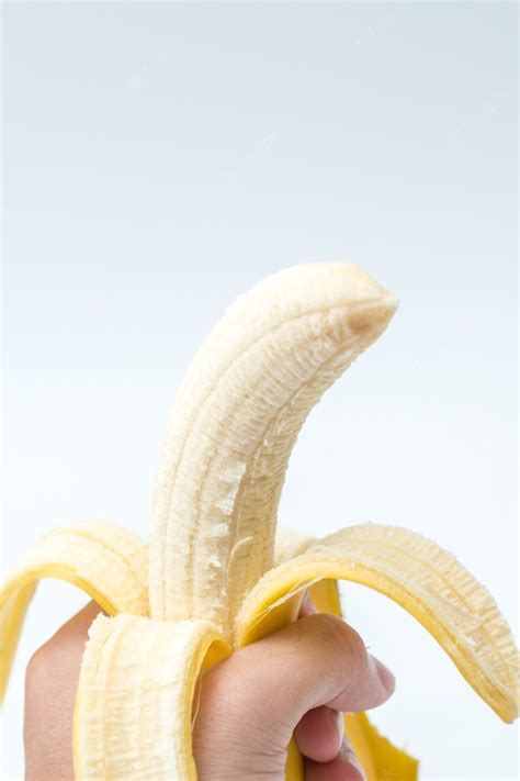 Premium Photo Human Hand Holding Banana Fruit Nutrition Concept