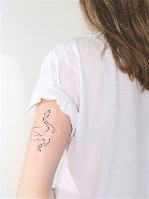 30 White Tattoo Designs That Look Like Magic Runes Runes Tattoo, Om ...