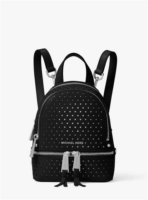 Lyst Michael Kors Rhea Mini Perforated Leather Backpack In Black