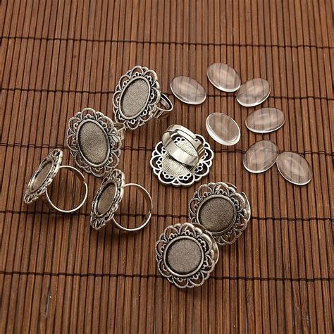 Wholesale X Mm Oval Transparent Glass Cabochons And Iron Flower