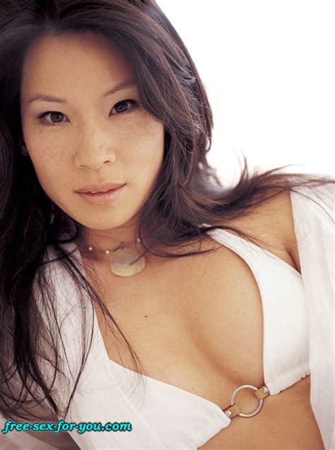 Lucy Liu Showing Her Nice Tits And Posing Very Sexy On Bed Porn