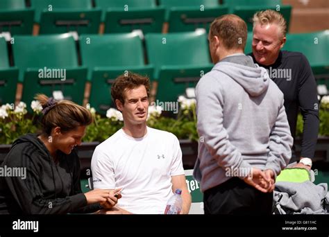 Andy Murray with coach Amelie Mauresmo and trainer Mark Little during ...