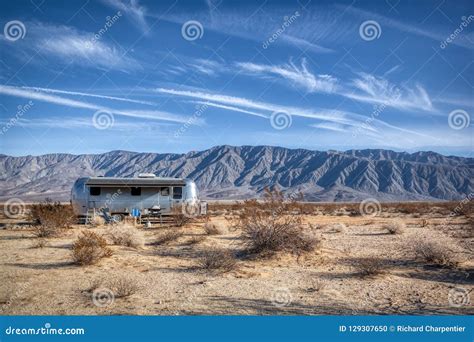 Desert Camping Airstream with Mountains in the Distance Editorial Image ...