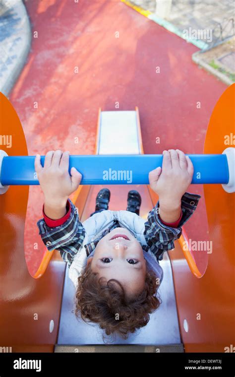 3 Year Old Boy Playing In A Playground Stock Photo Alamy