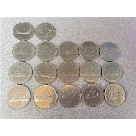 Canadian nickel dollars sheet of 17 various dates & grades