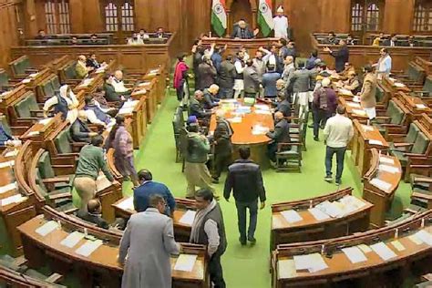 Delhi Assembly Bjp Mlas Marshalled Out Of Delhi Assembly After They