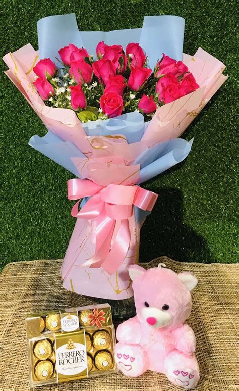 Buy 24 Pink Roses Bouquet With 24 Ferrero Rocher And Teddy Bear In