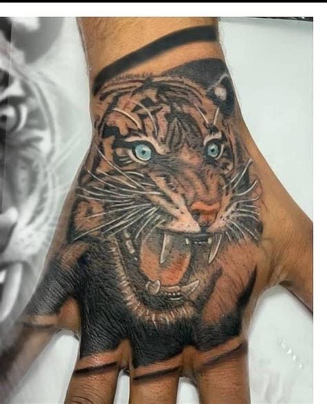 Tiger Tattoo Tiger Tattoo Hand Tattoos Tattoos