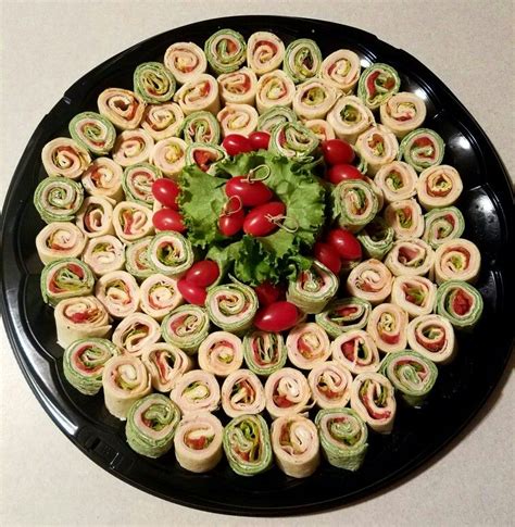 Mini Pinwheel Sandwiches Tray | Wedding buffet food, Appetizers easy ...