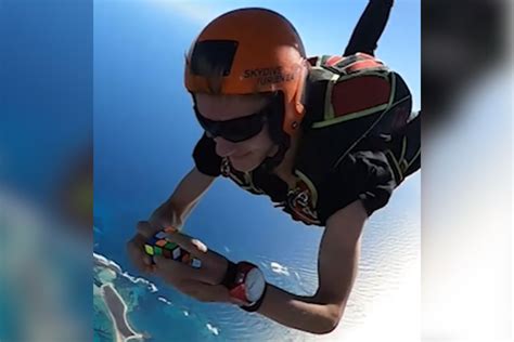Is This Teen Solving Rubik S Cube While Skydiving Impressive Or Not Free Beer And Hot Wings