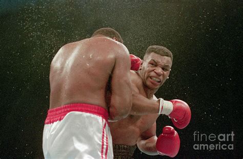 Mike Tyson Delivers Ko Punch To Larry Photograph By Bettmann Fine Art