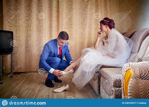 Russian Bride And Groom In The Room At Home In Ordinary Interior Of