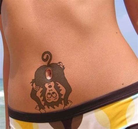 Tattoo Of Cats Bum On Belly Button