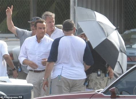 John Travolta's hairpiece stays on during action sequence | Daily Mail ...