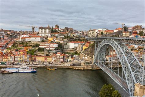 View Of The Historic City Center With The Famous Ponte Dom Luiz Bridge