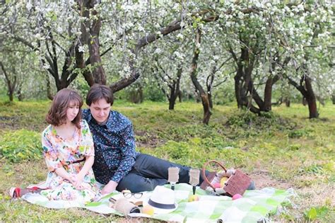 Premium Photo Young Couple On Date In Spring Park Outdoor