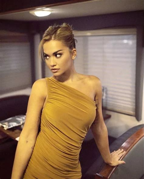 Rita Ora Pours Eye Popping Curves Into Nude Cocktail Dress For Sultry