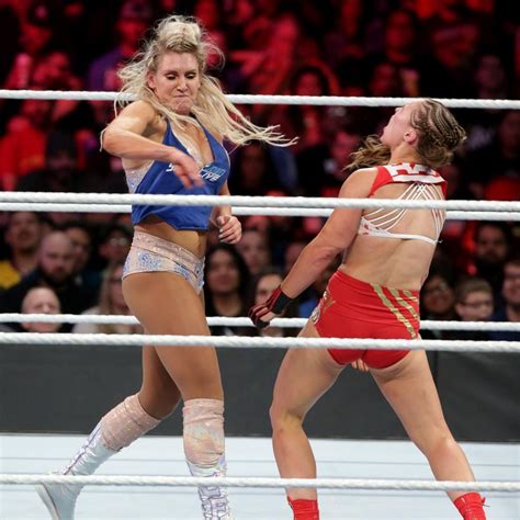 Photos: Ronda Rousey and Charlote Flair battle in brutal throwdown ...