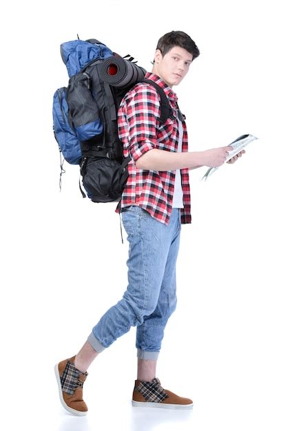 Premium Photo Man With Backpack Walking On White Wall